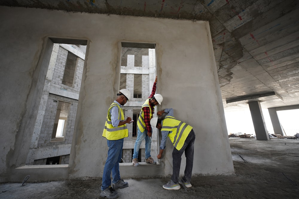 Engineers reviewing plans on a construction site