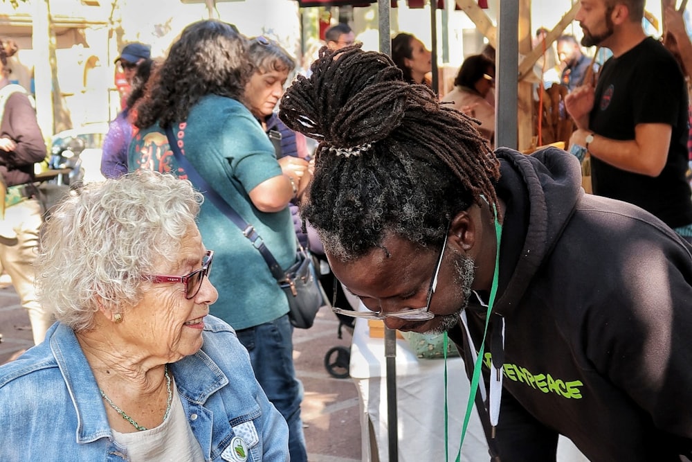 Support worker helping an older woman